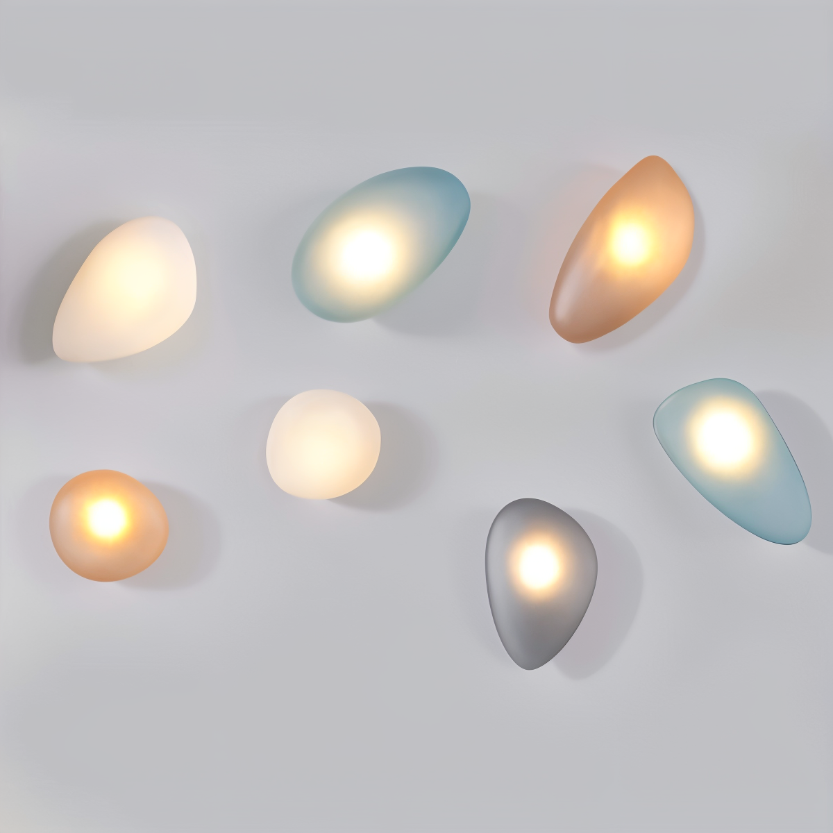 Pebblehue væglampe  - lysende led-væglampe lavet af glas i nordisk stil